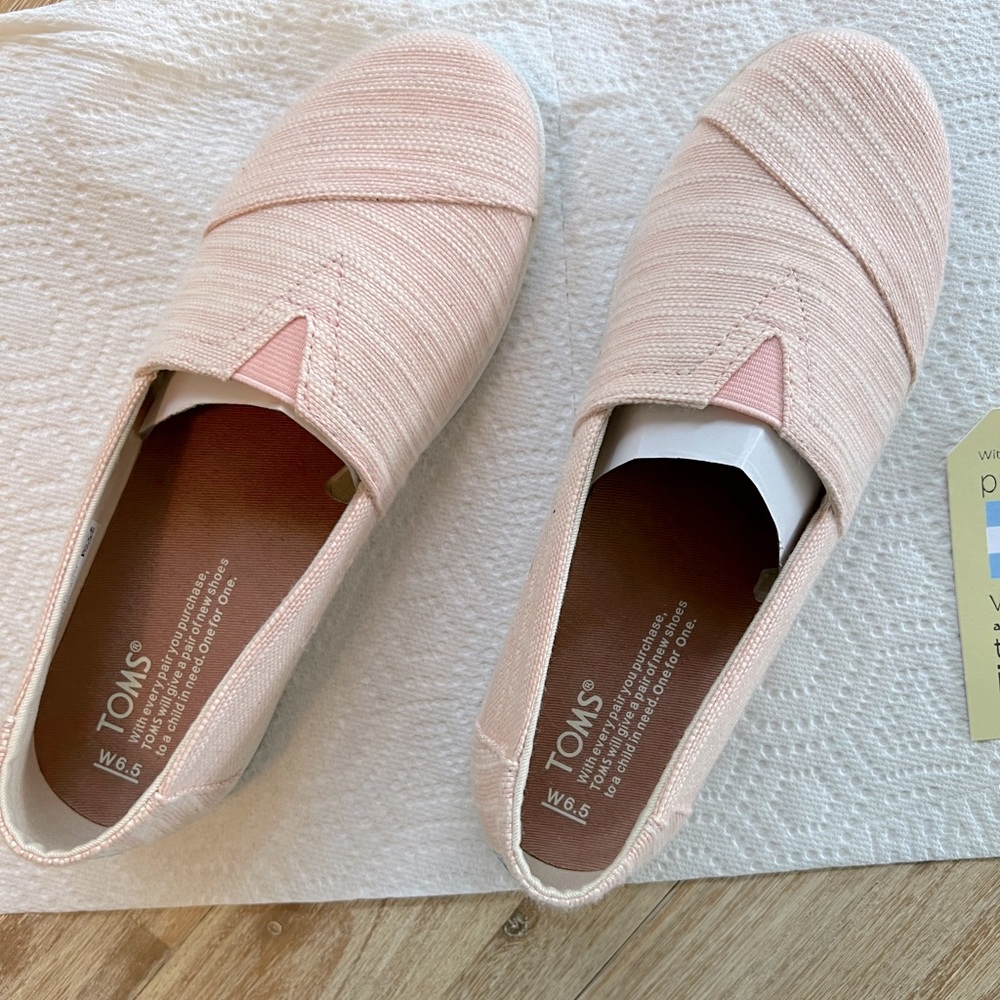 TOMS pink slip ons